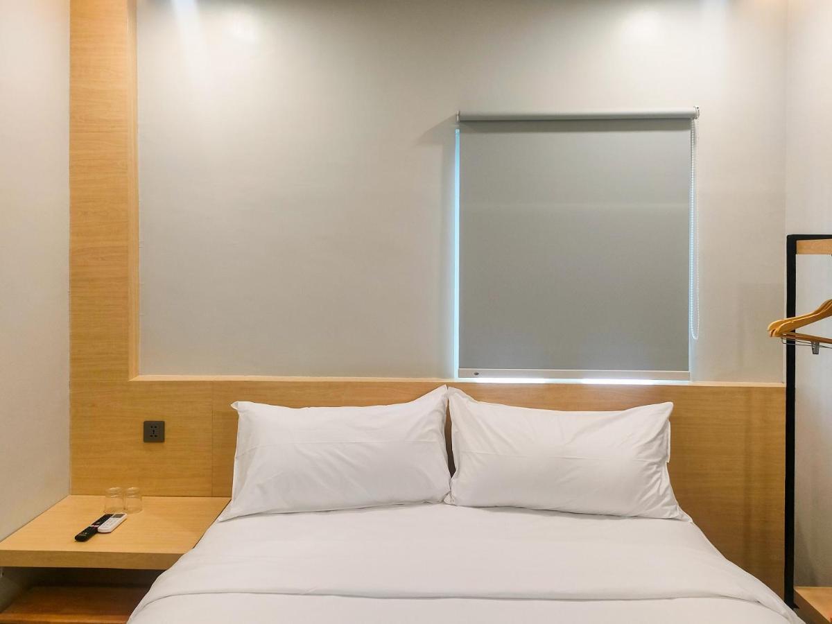 Travel Biz Hotel Medan Mitra Reddoorz Bagian luar foto